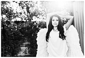 Girl with angel wings outdoors