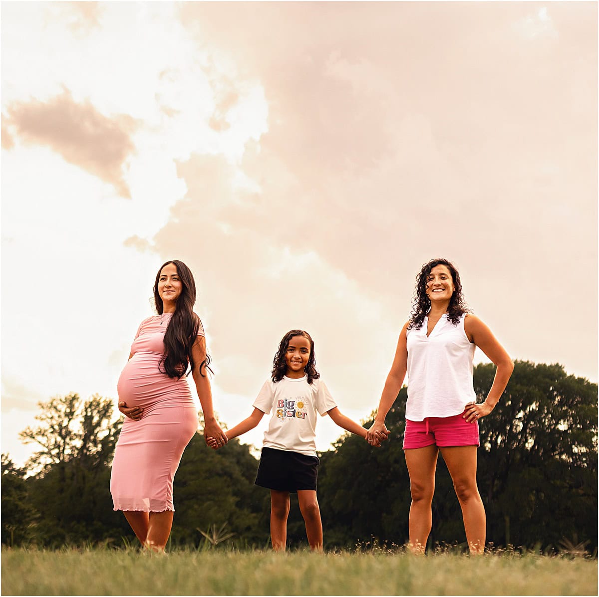 Maternity Photos in Arlington, TX | Two Mommas and a Stormy Sky