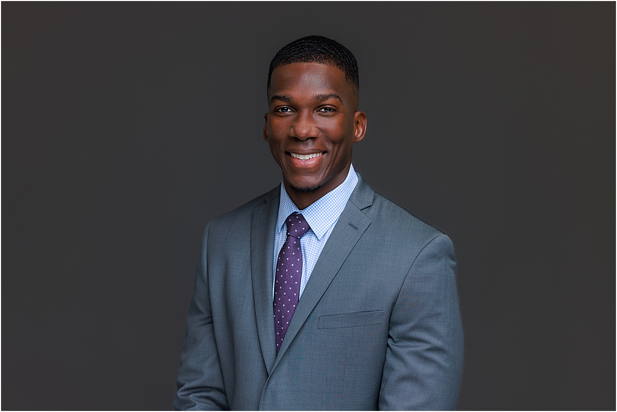 In Studio headshots. Man on dark background in suit
